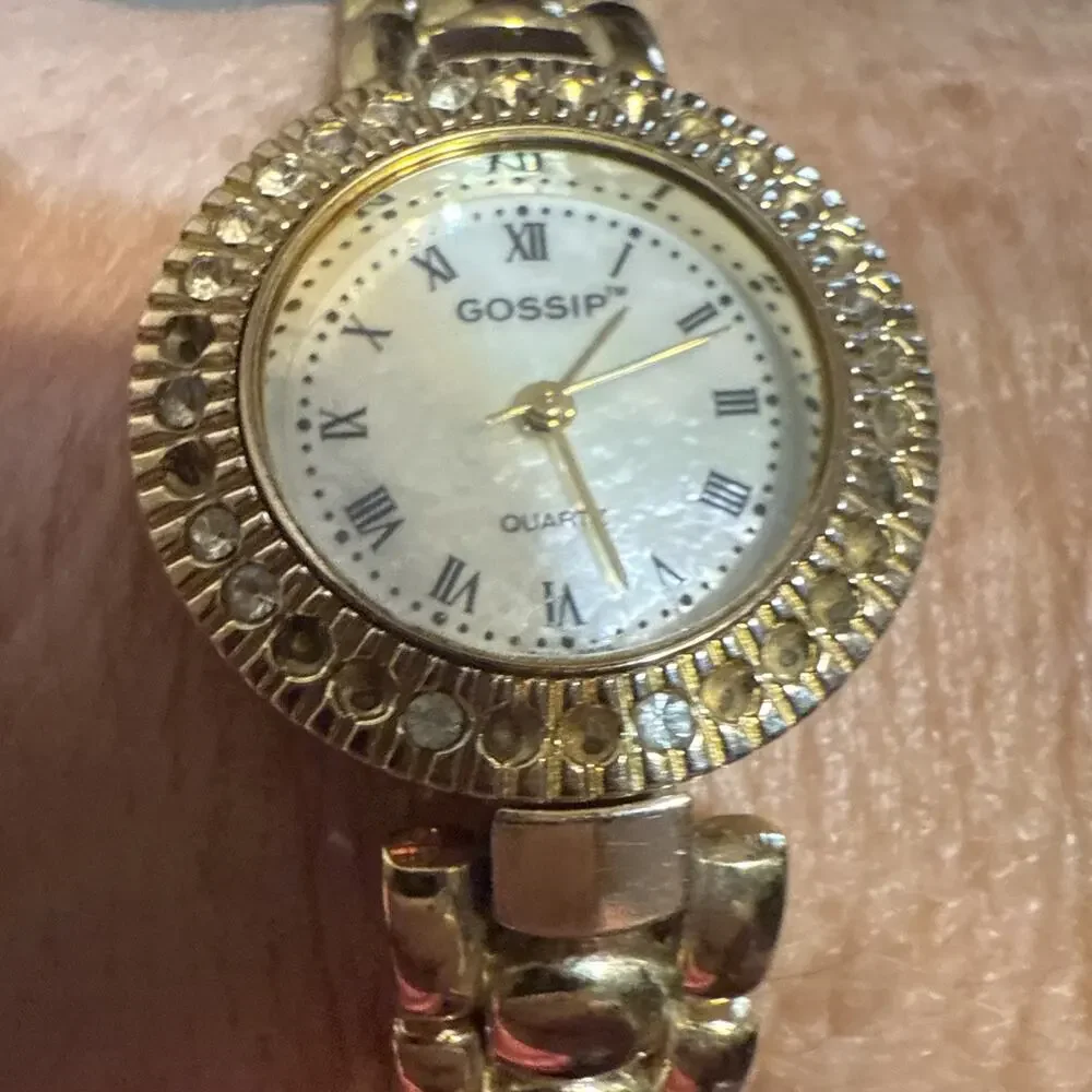 Gossip gold tone
